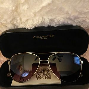 Brand new Coach Aviator Sunglasses.